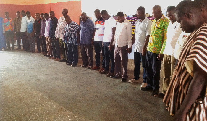  Political party representatives in a prayerful mood
